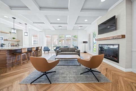 a living room with a couch and a fireplace